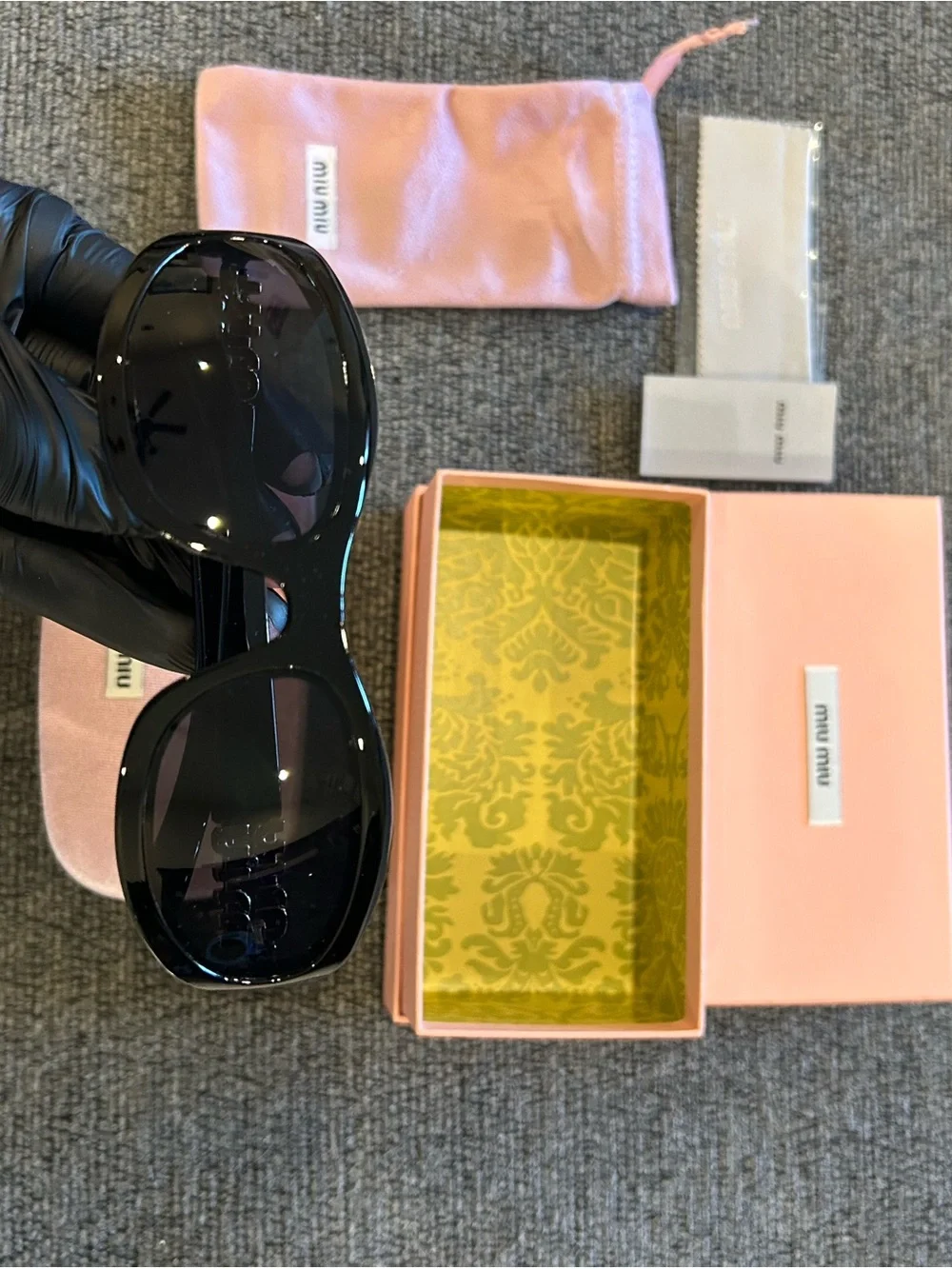 Miu Miu Black Sunglasses with Gold Temple Accents